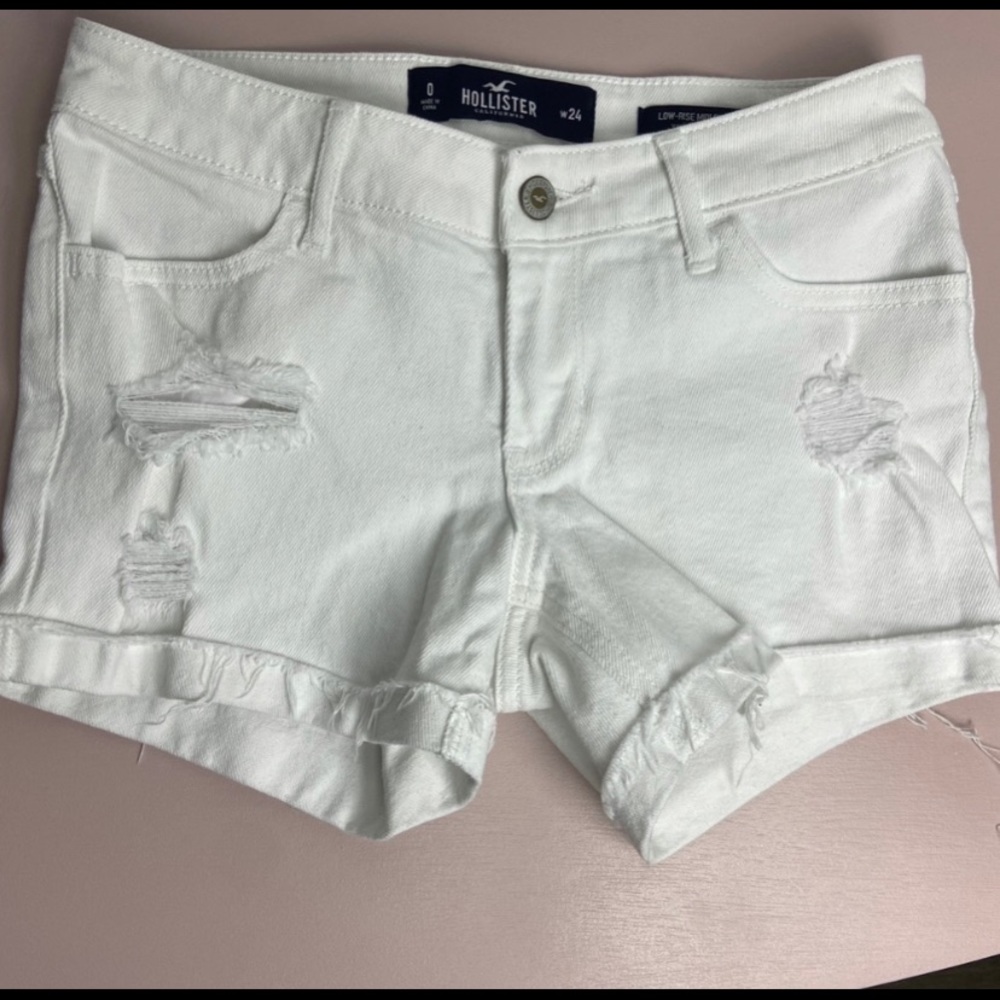 white ripped hollister jean shorts